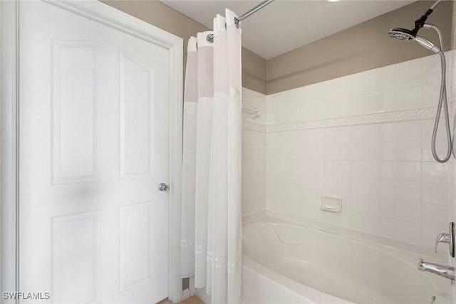 full bathroom with shower / bath combo