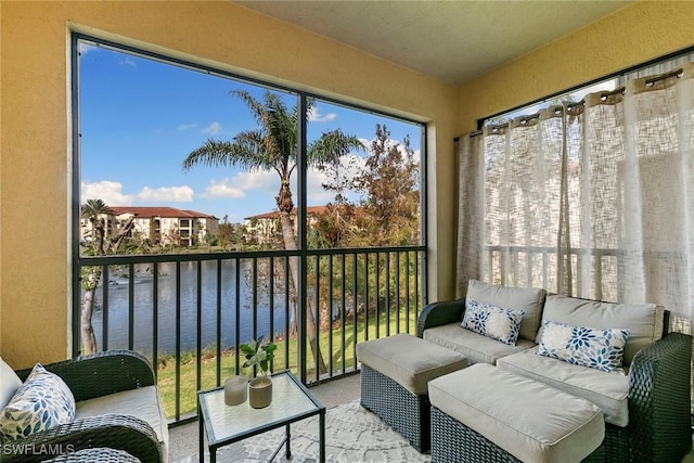 sunroom with a water view