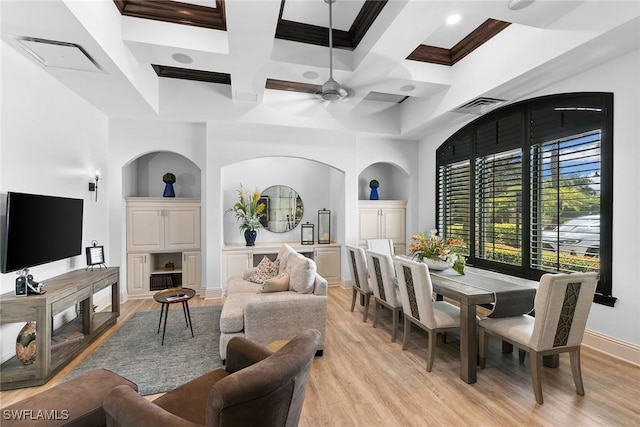 interior space with coffered ceiling, light wood-type flooring, visible vents, and ceiling fan