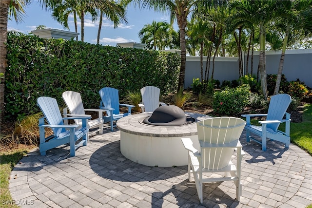 view of patio / terrace with a fire pit