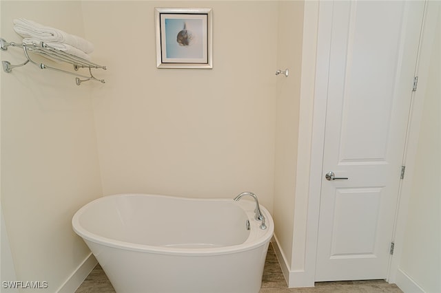 bathroom featuring a tub