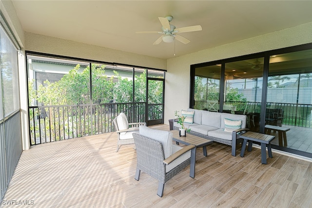 sunroom / solarium with ceiling fan