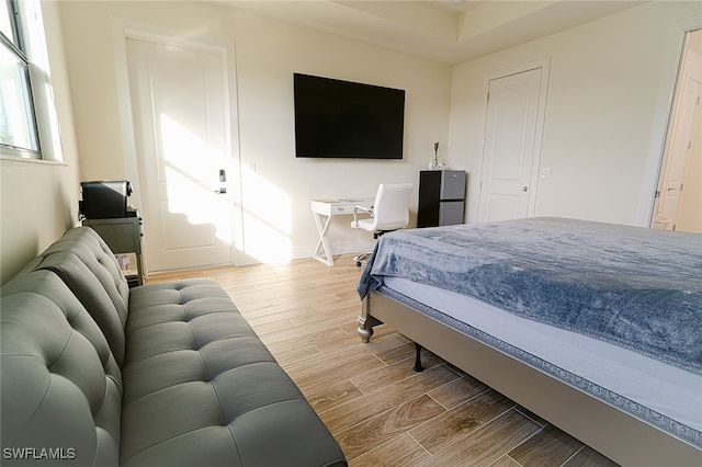 bedroom with light hardwood / wood-style flooring