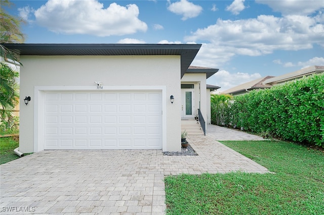 exterior space with a garage