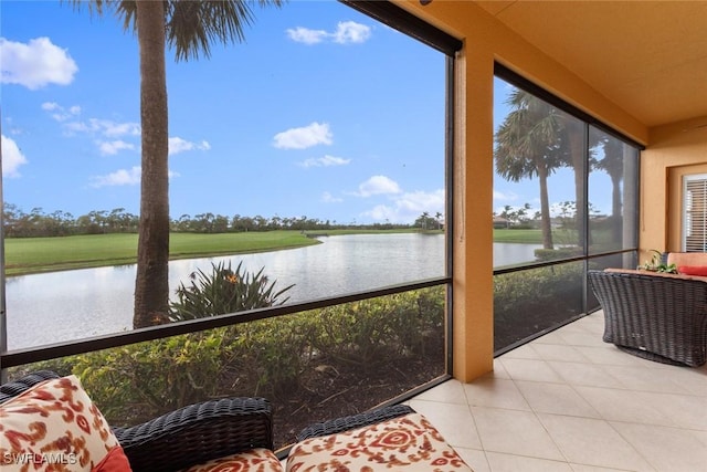 sunroom with a water view