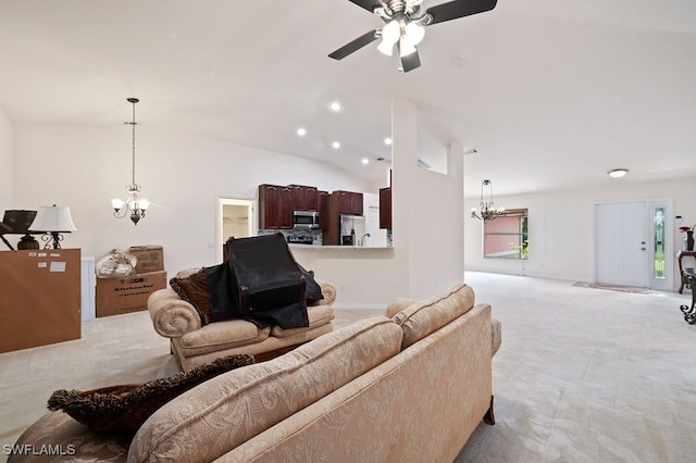 living room featuring ceiling fan with notable chandelier, lofted ceiling, and light carpet