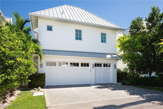 exterior space with a garage