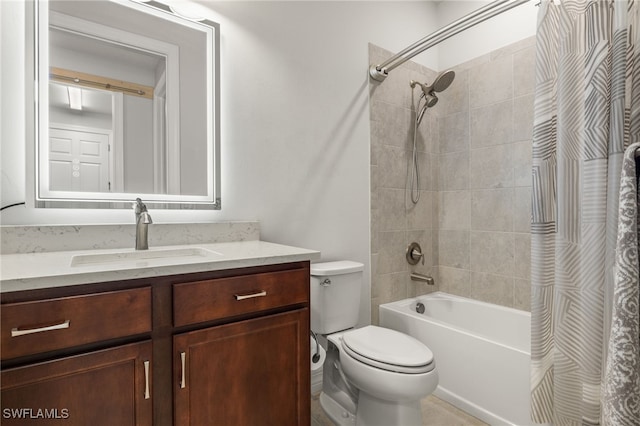 full bathroom featuring vanity, shower / bath combo, and toilet