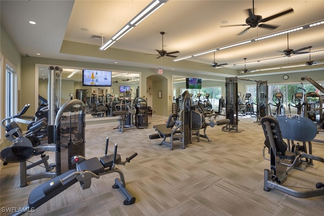 11283 Thurston Chase, Fort Myers, FL 33913 - workout area featuring ceiling fan, carpet flooring, arched walkways, and recessed lighting