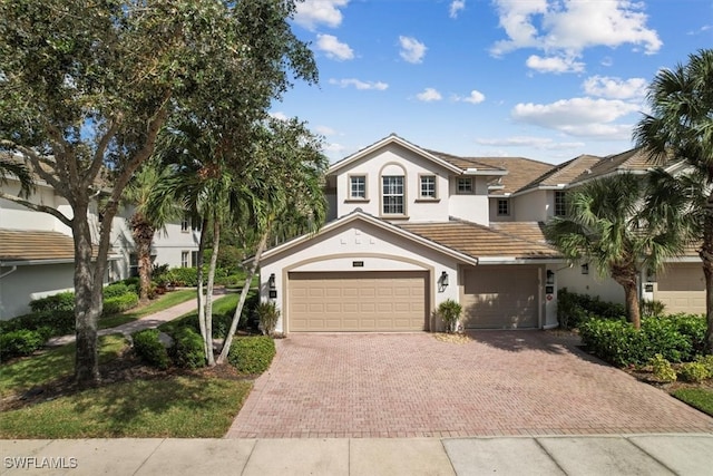 view of front of property featuring a garage