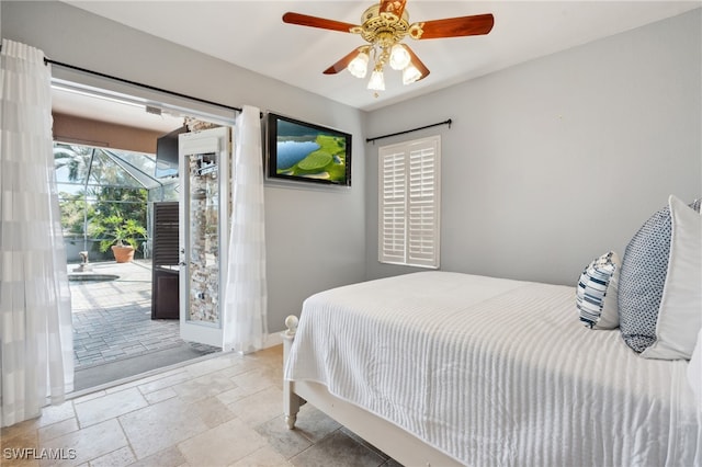 bedroom with ceiling fan and access to exterior