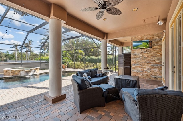 view of patio / terrace with a pool with hot tub, an outdoor living space, glass enclosure, and ceiling fan