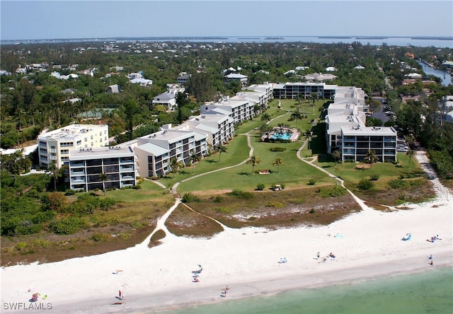 drone / aerial view with a view of the beach and a water view