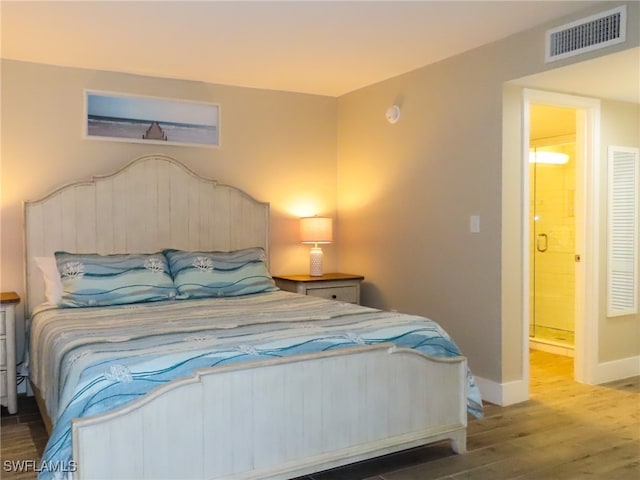 bedroom featuring hardwood / wood-style flooring