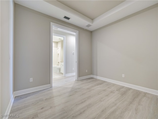 empty room with light wood-type flooring