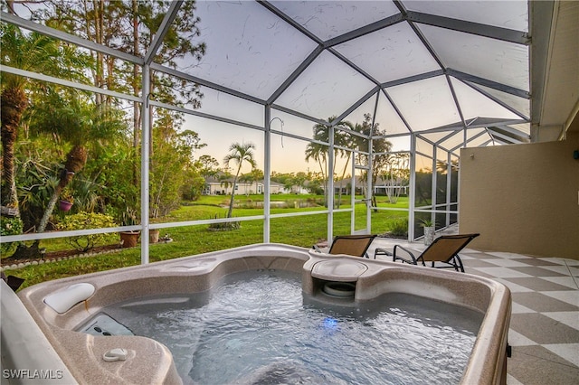 sunroom featuring a hot tub