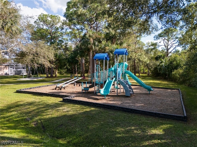 view of jungle gym with a lawn