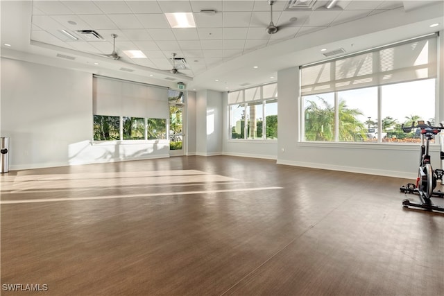 workout room featuring a paneled ceiling