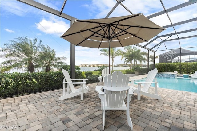 view of patio / terrace with pool water feature and glass enclosure