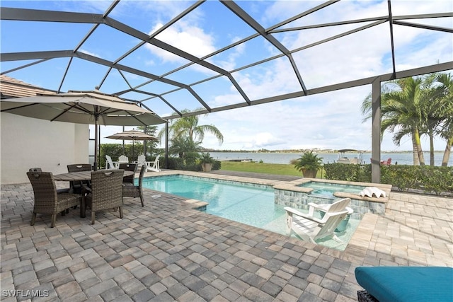 view of swimming pool featuring a water view, an in ground hot tub, a lanai, and a patio