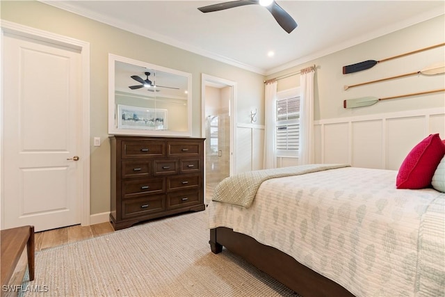 bedroom with crown molding and ceiling fan