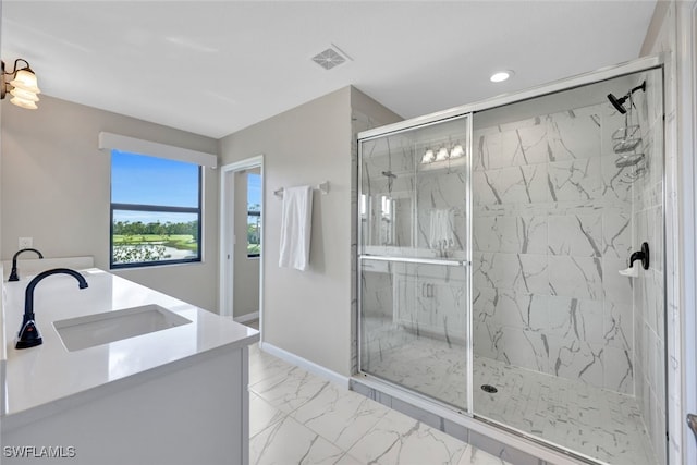 bathroom featuring vanity and walk in shower