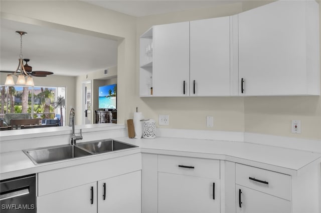 kitchen with dishwasher, sink, white cabinets, and ceiling fan