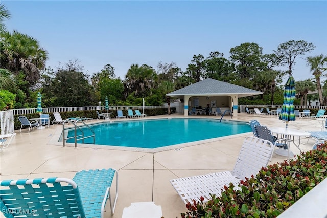 view of swimming pool featuring a patio