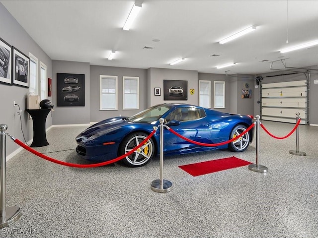 garage with baseboards