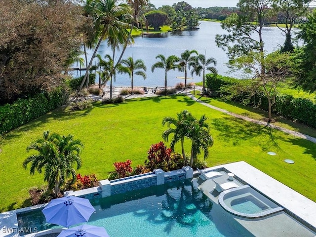 birds eye view of property featuring a water view