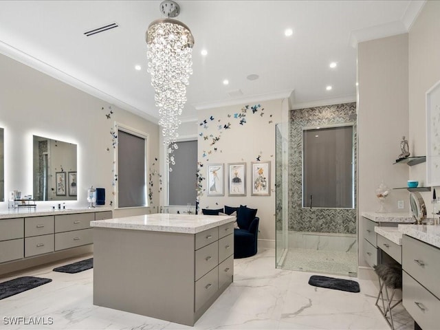 bathroom with a chandelier, visible vents, marble finish floor, a stall shower, and crown molding