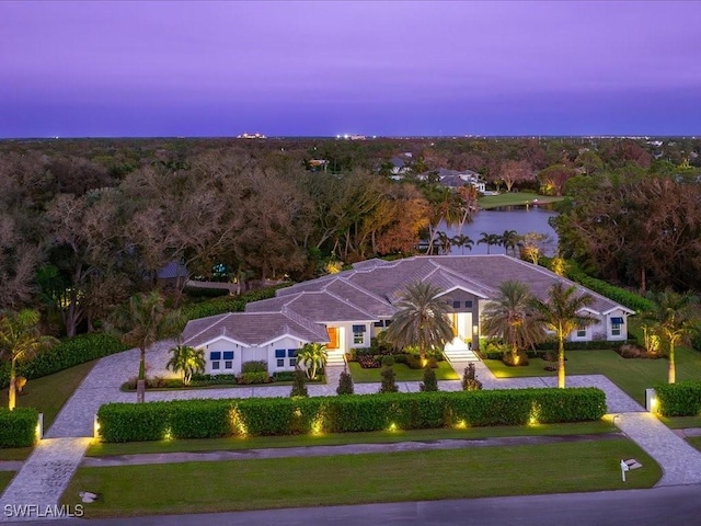 bird's eye view with a water view