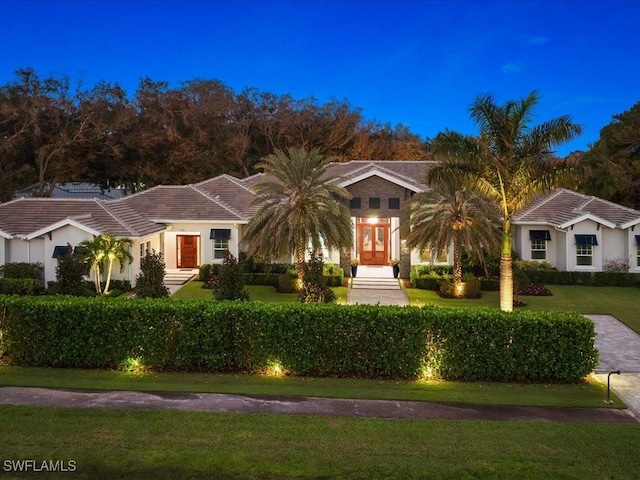 view of front of house with a front lawn