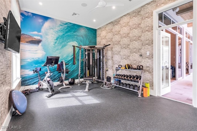 gym featuring visible vents and crown molding