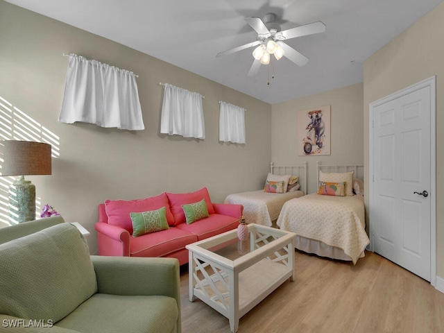 bedroom featuring ceiling fan and light wood-type flooring