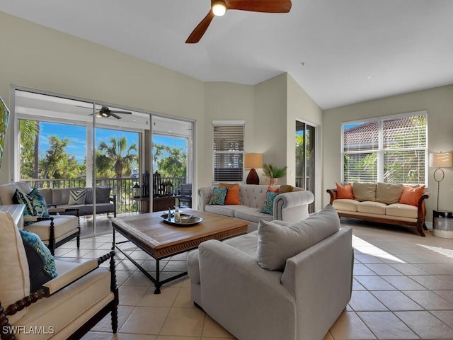 living room featuring french doors, light tile patterned floors, and ceiling fan