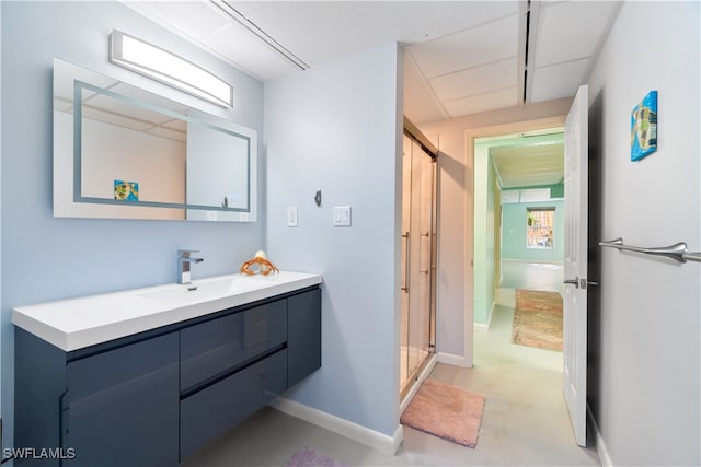 bathroom featuring vanity, concrete flooring, and walk in shower