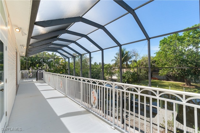 view of patio / terrace featuring glass enclosure