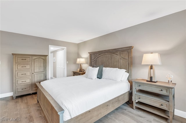 bedroom featuring light hardwood / wood-style flooring