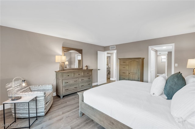 bedroom featuring light wood-type flooring