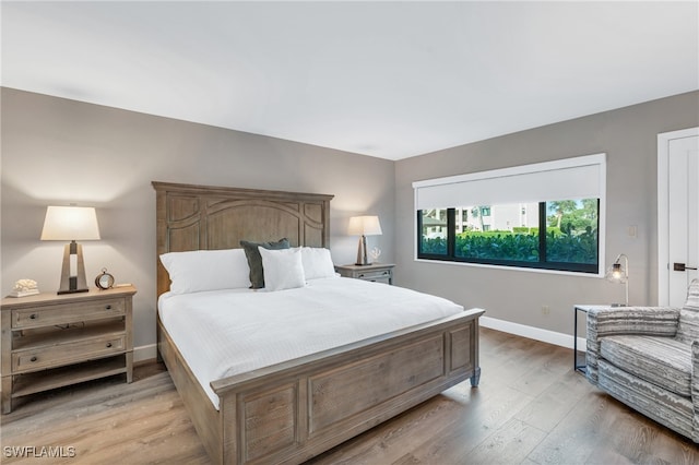 bedroom featuring light hardwood / wood-style flooring