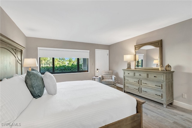 bedroom featuring light hardwood / wood-style flooring