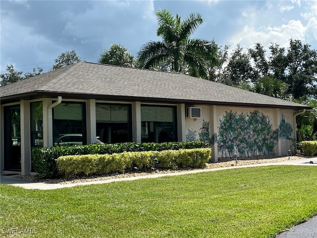 ranch-style home with a front yard