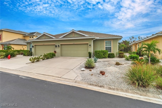 view of front of home with a garage