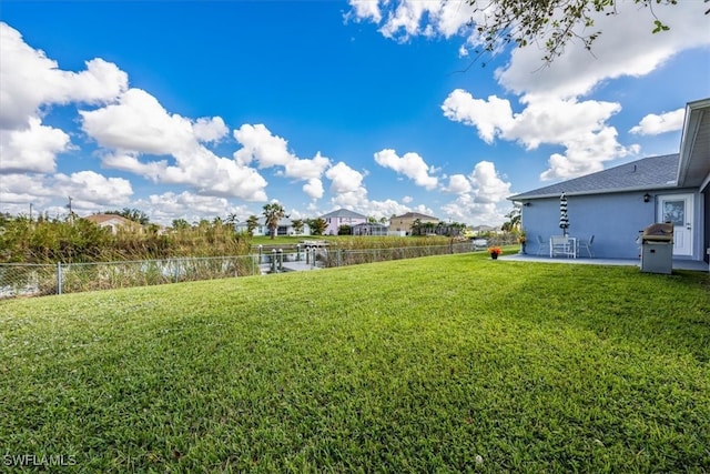 view of yard with a water view