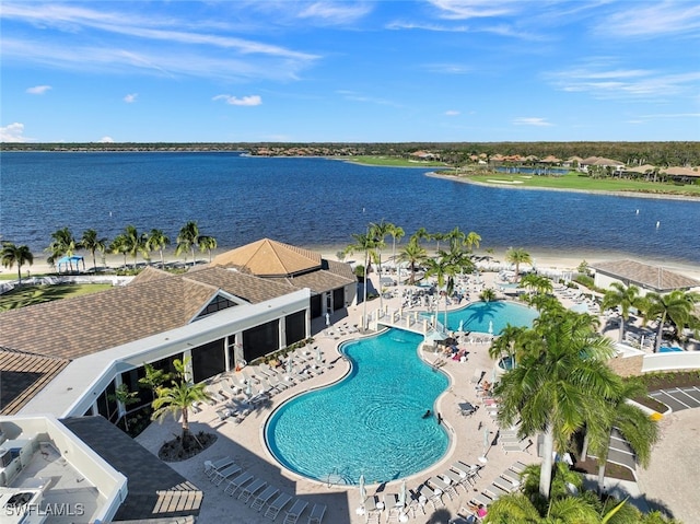 birds eye view of property featuring a water view