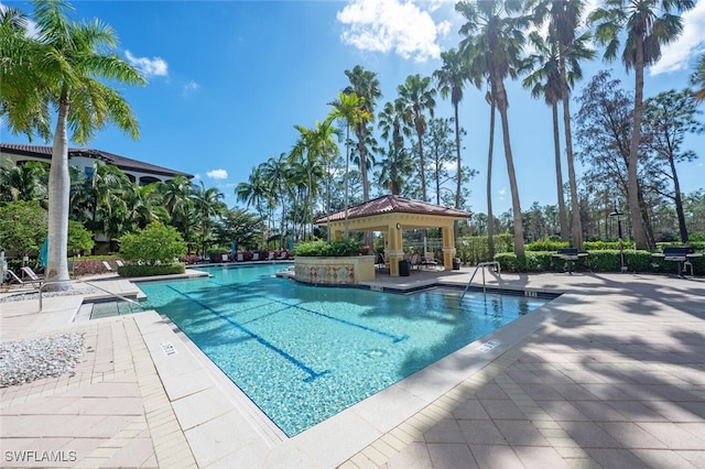 view of pool with a patio and a gazebo