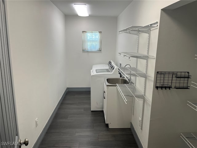 washroom featuring separate washer and dryer and dark wood-type flooring