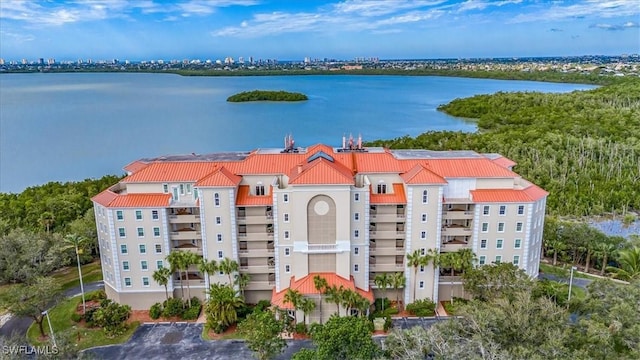 birds eye view of property featuring a water view