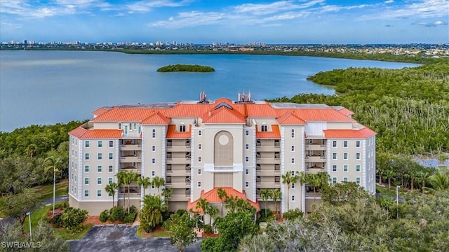 drone / aerial view with a water view